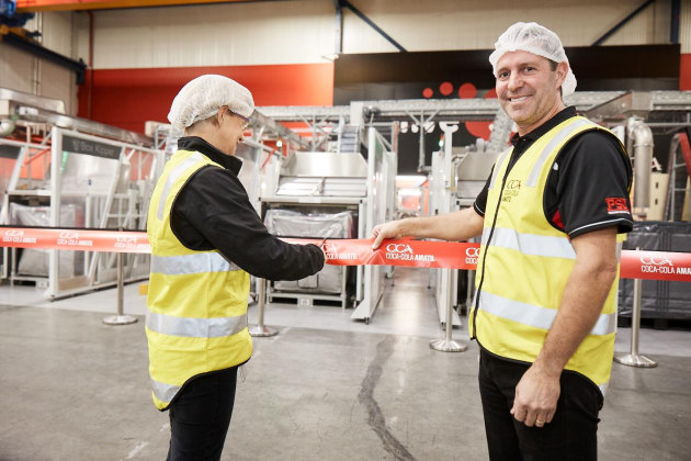 CCA CEO Alison Watkins and operations manager David Chalmers cut the ribbon.