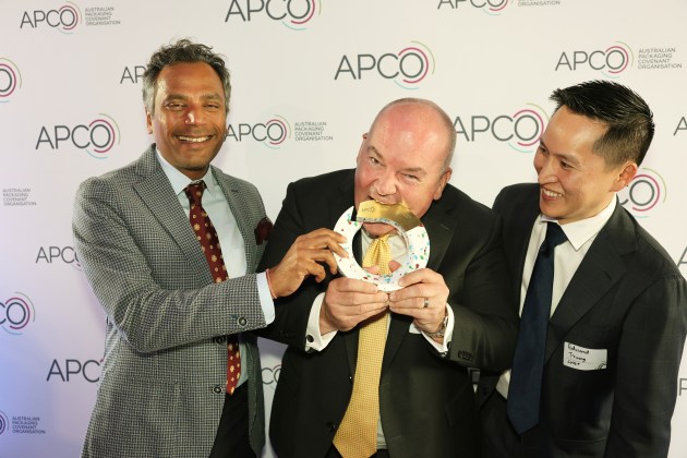 The CHEP team tests the strength of the awards, designed by Defy Design, and made in Australia from 100% recycled plastic.