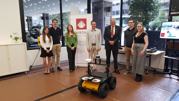 The Chironix team and Kim Beazley in the company's lab. Credit: Chironix