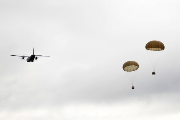 A C-27J Spartan from No 35 Squadron delivers stores to Lockhart River.
Defence