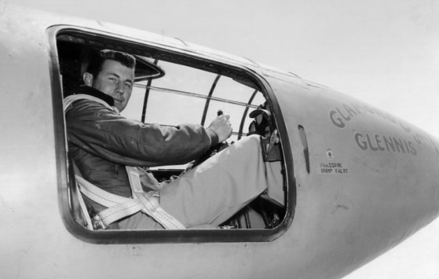 Captain Chuck Yeager demonstrates the tight fit of the Bell X-1 cockpit after breaking the sound barrier in 1947. (US Air Force)