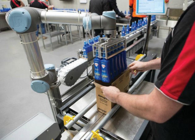 Cobots used to place bottles in cases and cases on pallets. (Image: Andrew Donald Design Engineering)