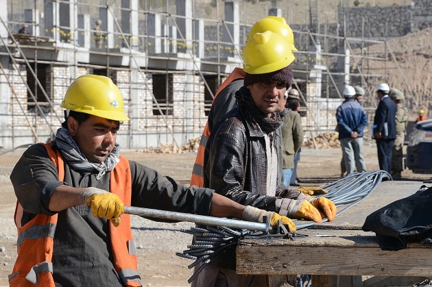 Workers on building site