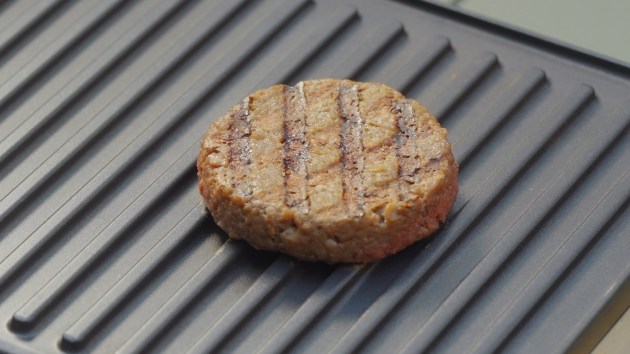 The cooked burger - V2food's patented RepliHue technology allows plant-based meat to change colour as it cooks, mimicking animal meat.
