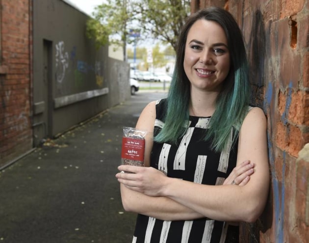 Ellen Burns is changing the packaging on her health food bars from recyclable to home compostable in a bid to reduce waste. 
Picture: Lachlan Bence 
Source: The Courier