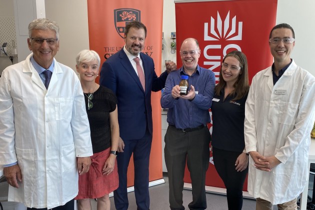Members of the research team with Minister for Industry and Science Ed Husic.