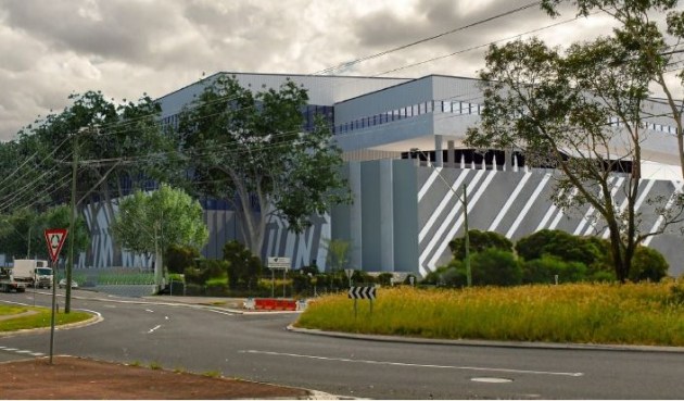 Woolworths Group has announced a new $400 million distribution centre at Wetherill Park in western Sydney as it flags several significant pre-tax items that will impact its full-year results.