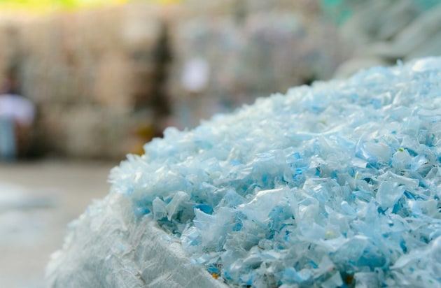 Plastic flakes from bottles at a recycling plant