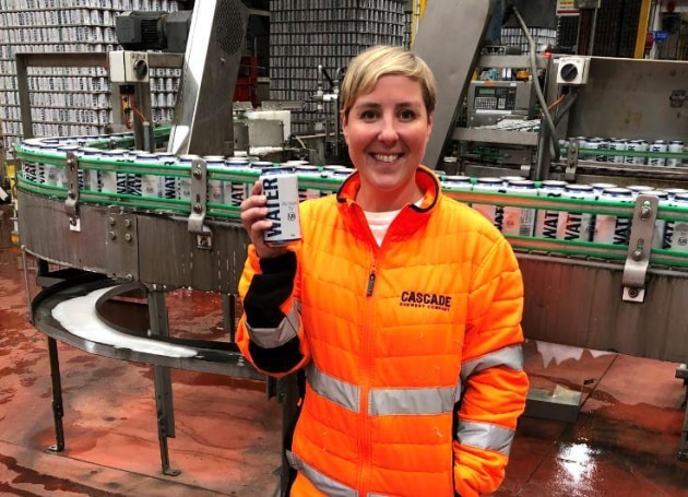 Cascade Brewery manager Anita Holdsworth oversees the production of free drinking water for disaster-affected communities. (Image: CUB)