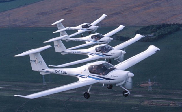 Two-seat Diamond DA20s. Five of the type are being refurbished for service in Australia. (Utility Air)