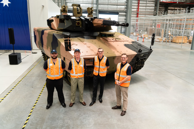 Craig Ramsay and Nick Stokes of Defcon Technologies, Lee Davis, General Manager Land 400 Phase 3, and Gary Stewart, Managing Director of Rheinmetall Defence Australia. Supplied