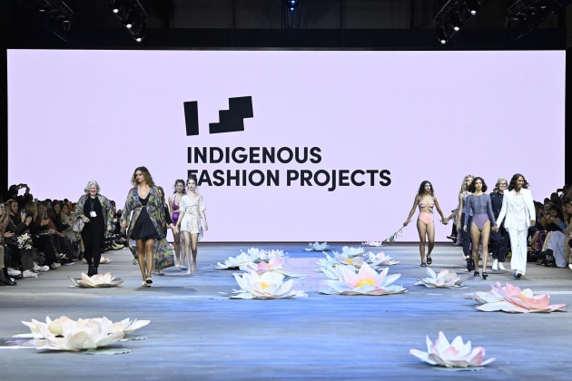 Designers Nancy Pattison, Natalie Cunningham, Liandra Gaykamangu, Amanda Healy, Denni Francisco and Julie Shaw with models at the Indigenous Fashion Projects show during AAFW.
