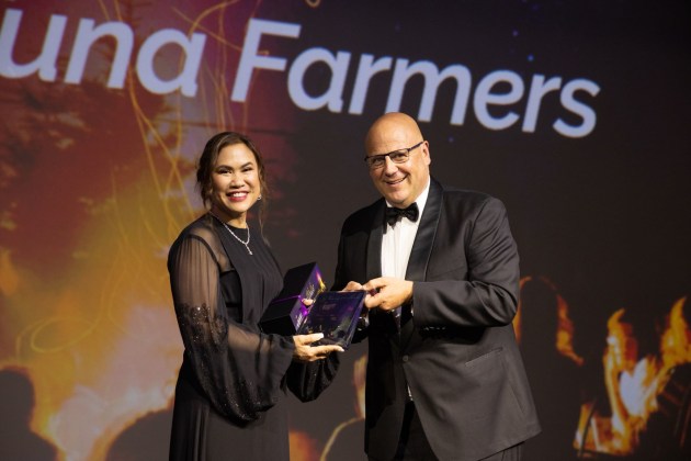 Lukina Lukin owner of Dinko Tuna Farmers accepting the Innovation in Business Award from Hon David Basham MP, Minister for Primary Industries and Regional Development