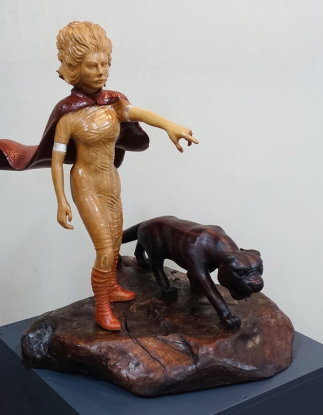 Donald Powell, The Lady and the Panther, walnut, white beech, silver.
"Thinking about Cleopatra and the lions and about the huntress Diana  inspired me to this project. Carving faces,figures and animals is my speciality and added to this is a particularly vivid imagination which I strive to bring to life in my work. I see The Lady and  the Panther as a sensual figure commanding  a graceful and powerful animal.