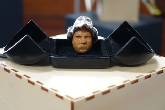 Donald Wright, Huon pine, walnut (Tiny Treasures). Inspired by medieval warriors carved from Huon pine and walnut adorned with precious gems, gold and silver.