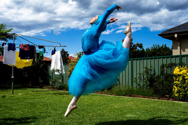 Third Place - Dreaming of becoming the first Muslim hijabi ballerina in the world by Edwina Pickles.
Stephanie Kurlow, aged 14, is aspiring to become the first professional hijabi ballerina in the world. The photo was taken in her backyard in Sydney, Australia, for an editorial story in The Sydney Morning Herald. After the photograph was published, her story went viral and was picked up by numerous news outlets around the world. She received a scholarship to attend a ballet school with the exposure of the story and a chance to make her dream come true.