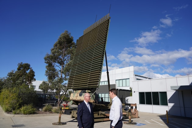 Lockheed Martin Australia Phil Gordon and Nicholas Wells in front of the Tactical Air Defence Radar System.

Credit: Kirra Davey