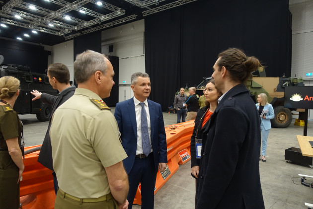 Colonel Robin Smith, Head RICO and Assistant Minister for Defence Matt Thistlewaite speak with Praxis Mabs&rsquo; Katie & Cameron Donaldson. (Nigel Pittaway)