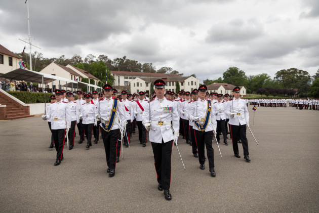 The December 2018 graduating class of the Royal Military College Duntroon march off the parade ground.
Defence