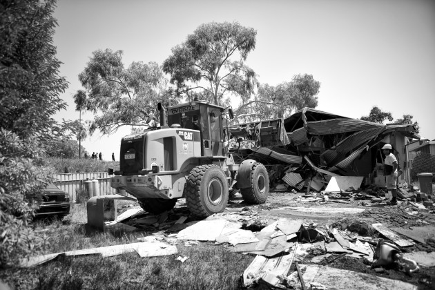 "Now the community should get together as one, join hands and try seek to gain the loss by approaching various government departments in an appropriate manner for assistance." Kennedy Hill resident, Sandy Isaac mentioned. This demolition took place on 19 September 2014 in Kennedy Hill. Broome, Western Australia. &copy; Ingetje Tadros/Diimex.