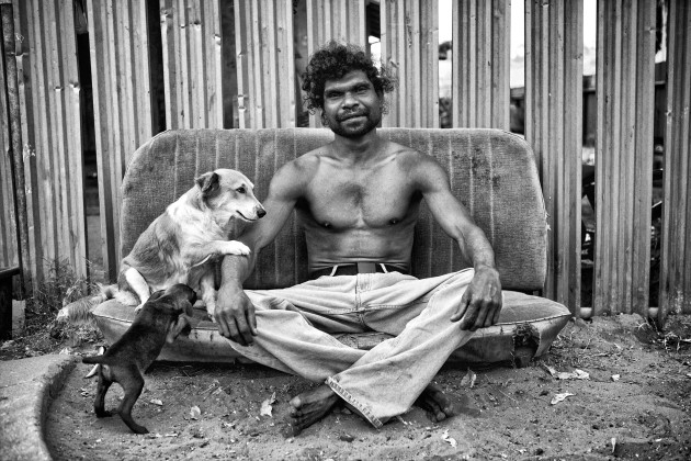 "Alcohol can bring you down and kill you. It will. To me, I was happy to die. I lost my father. He was my hero. I had a bad record. I know now my job is to save my people." &lsquo;Billy&rsquo; Stuart Ah Choo sitting outside his home in Kennedy Hill with his beloved dog, Dontee and her pup, Little Blacky. Broome, Western Australia. &copy; Ingetje Tadros/Diimex.