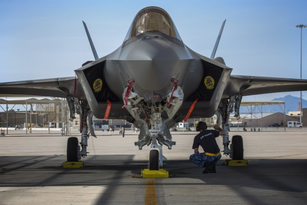 Royal Australian Air Force maintainer, Corporal Cory Cochrane, inspects an Australian F-35A on the flight line at Luke Air Force Base, Arizona, USA. Defence