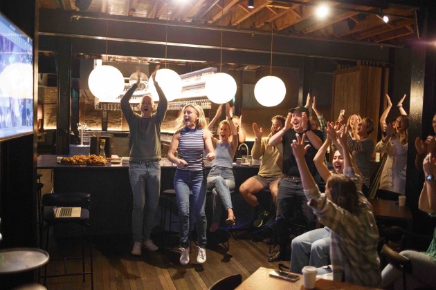 The Four Pillars team at its Sydney Laboratory on hearing the distillery had been announced Gin Distillery of the Year at the 2023 International Wine & Spirits Competition.