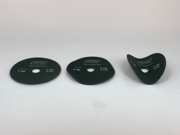 Examples of concave and convex 'cupping' caused by either too wet or too dry humidity when stored.