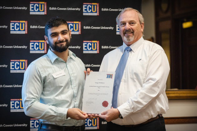 Lockheed Martin Australia&rsquo;s Rotary and Mission Systems Program Manager, Russell Page, presents the Lockheed Martin Australia Computer Science Award to Edith Cowan University student, George Shomali. (Supplied)