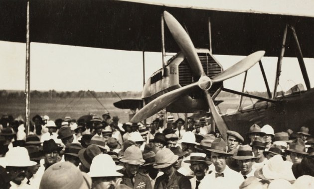 A crowd gathers around the Smith Brothers' modified Vickers Vimy in 1919. (Library of NSW)