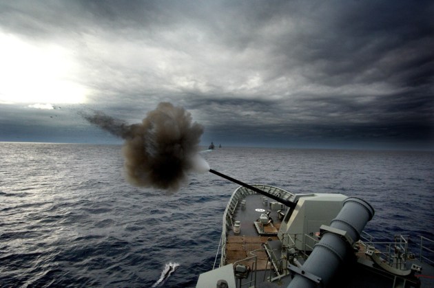 HMAS Warramunga fires her five-inch gun off the coast of NSW.
Defence