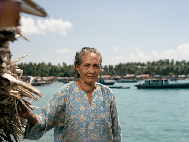 Sea gypsies are exposed to the elements and live a harsh life. Many do not live to be elderly like Misma, who does not know how old she is. &copy; Mark Lehn.