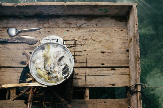 Fish dinner on a Lepa Lepa. &copy; Mark Lehn.