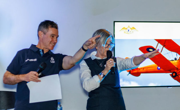 Matt Hall and Angela Stevenson call in bids at the NRAC fundraising auction. (Liz Barratt Photography)