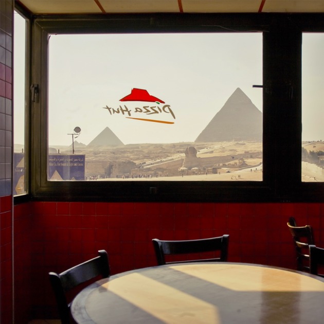 LANDSCAPE&ndash; FIRST PLACE &ndash; Roger Grasas - Giza Pyramids.
&ldquo;View of the pyramids and the Sphinx of Giza (Egypt) from the dining room of a well-known American restaurant of pizzas and fast food.&rdquo;