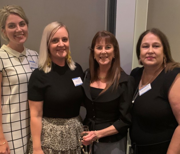 PKN's Sharon Amos (second from right) with (from left) Brittany Cook,  Anna Dreyer, and Tracy Anderson of Heat and Control.