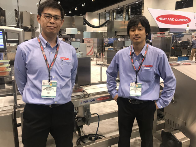 Heath and Control and Ishida's weigh price labeller was demonstrated by Ishida's Shingo Akita (right) and Tomohira Kitayama. The company says it's likely that this machine will be on show at AUSPACK 2019.