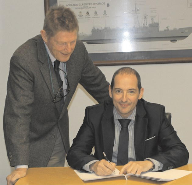 Warwick Lorenz of API signs both Distribution & Representative Office Agreements while Raphael Legrand of Howden looks on.
Credit: API