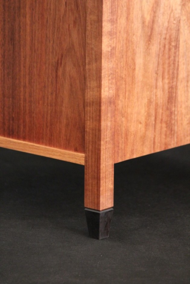 Blackwood and celery top pine bedside cabinet with curved front by Douglas Keith