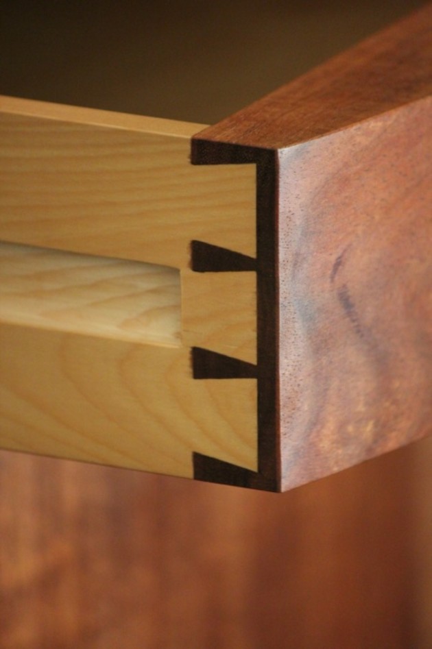 Detail of blackwood and celery top pine bedside cabinet by Douglas Keith