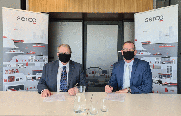 Serco Defence Managing Director Clint Thomas and GHD Defence Sector Leader Damian Drain signing a Memorandum of Understanding (MOU) on 1 November. (Supplied)
