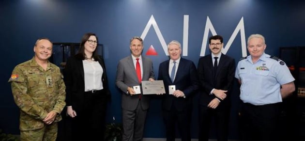 L-R: Colonel Robin Smith, Director, Robotic and Autonomous Systems Implementation & Coordination Office (RICO); Ms Jessica Glenn, Co-founder of AIM Defence; Minister for Defence, Richard Marles; Minister for Skills and Training, Brendan O&rsquo;Connor; Dr Jae Daniel, Co-founder of AIM Defence; and Group Captain Michael Burgess Orton, Director, RAAF&rsquo;s Plan Jericho. (AIM Defence)