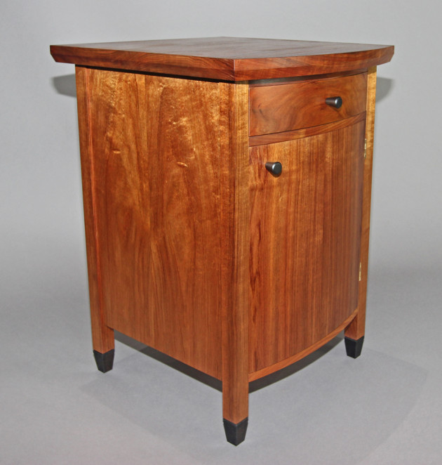 Blackwood and celery top pine bedside cabinet with curved front by Douglas Keith
