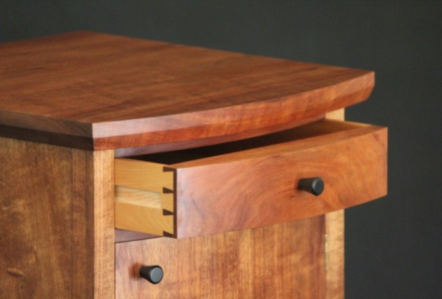 Blackwood and celery top pine bedside cabinet with curved front by Douglas Keith