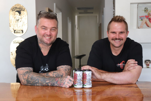 Mudgee&rsquo;s Three Tails Brewery has released a unique beer in collaboration with and named after tattoo parlour, Love and Chaos. Pictured is Love & Chaos owner Scott Menzies, with Three Tails Brewery head brewer Jono Beazley.
Source: Three Tails