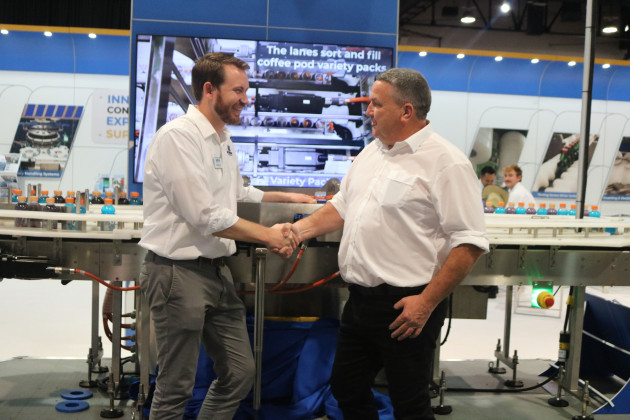 Kevin Redmond, new business manager for the Morrison Tronics partnership (right), on the Morrison stand at Pack Expo with Dustin Lee (left), Morrison CHS.