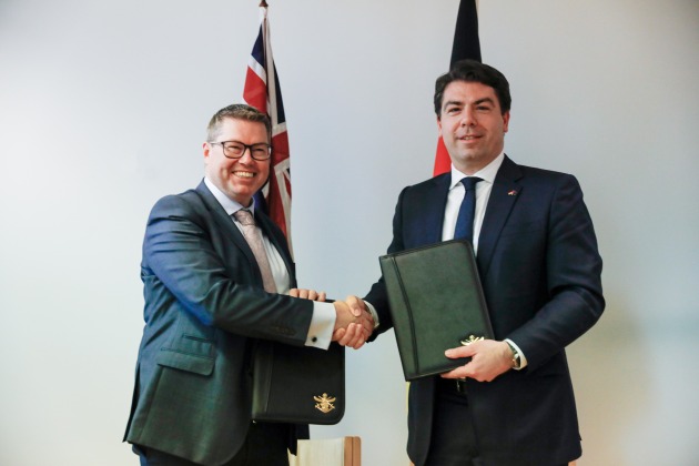 Minister for Defence Industry Pat Conroy and German Parliamentary State Secretary for Defence Thomas Hitschler sign a Letter of Co-operation on Boxer Heavy Weapon Carrier Vehicle production at Parliament House on the 23 March 2023. (Defence)