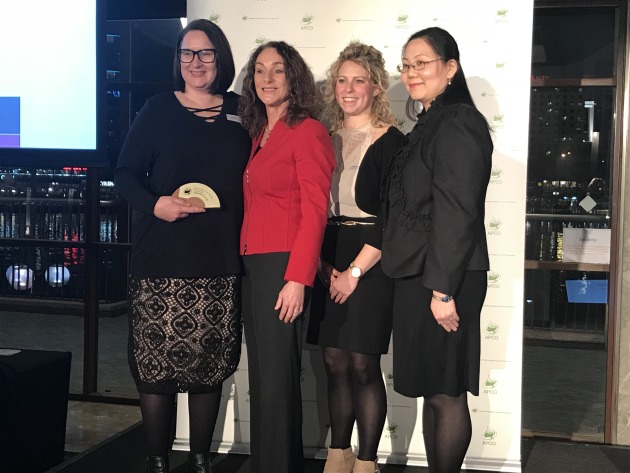 Campbell Arnott's won Outstanding Achievement in Packaging Design at the APCO awards. Liza Vernalls (left) receives the award from APCO chair Sam Anderson, along with colleagues Andrea Steen (second from right) and Angela Yi.