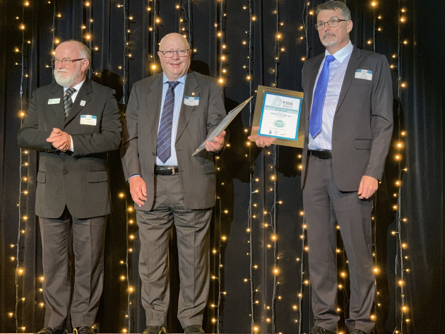 The AIP's Ralph Moyle stands by as finalists Terry Waterson (Auspouch) and Joe Foster (OF Packaging) wait to hear who will be announced Industry Professional of the Year 2019.