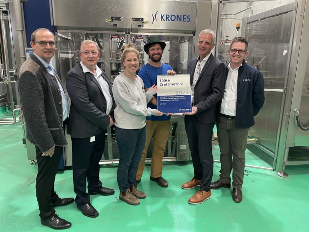 Marking the 100th Craftmate C installation with a special plaque: from left: Krones Pacific head of sales Franz Kirchberger; Krones Pacific MD Richard Gahagan; Mountain Culture's Harriet McCready and DJ McCready; Krones head of sales, Thomas Gerstl; Krones Pacific sales manager Grant Day. Image: PKN